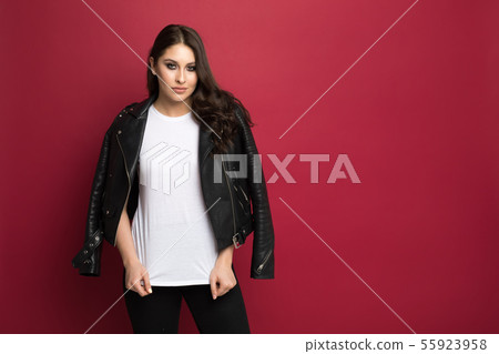 Beautiful young woman in a white t-shirt and jacket . Mock-up. Beautiful young woman in a white t-shirt and jacket . Mock-up. 55923958