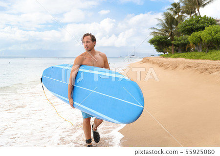 Surfer man going longboard surfing on maui beach Surfer man going longboard surfing on maui beach 55925080