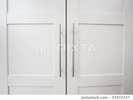 White closet doors wood closeup background texture modern design White closet doors wood closeup background texture modern design 55933337