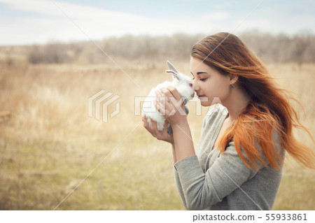 the girl with the rabbit.happy 55933861