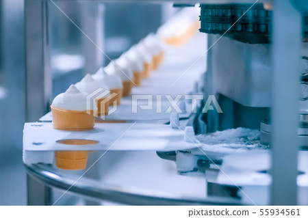 Ice cream automatic production line - conveyor belt with icecream cones 55934561