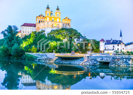 Melk Abbey, German: Stift Melk, reflected in the water of Danube River by night, Wachau Valley 55934725