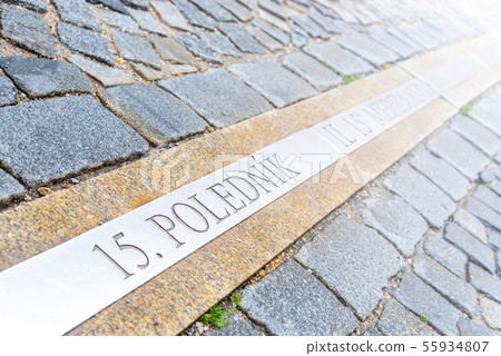 15th meridian line in cobbled street of Jindrichuv Hradec, Czech Republic. Inscription 15. polednik 15th meridian line in cobbled street of Jindrichuv Hradec, Czech Republic. Inscription 15. polednik 55934807
