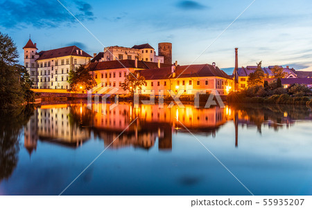 Jindrichuv Hradec Castle by night. Reflection in the water. Czech Republic Jindrichuv Hradec Castle by night. Reflection in the water. Czech Republic 55935207