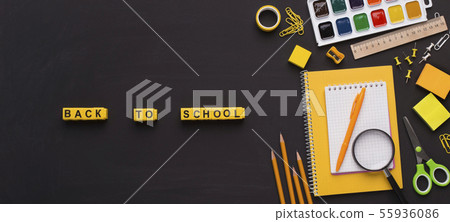 Yellow colored school supplies with back to school text Yellow colored school supplies with back to school text 55936086