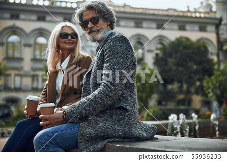 Mature couple on the fountain stock photo Mature couple on the fountain stock photo 55936233