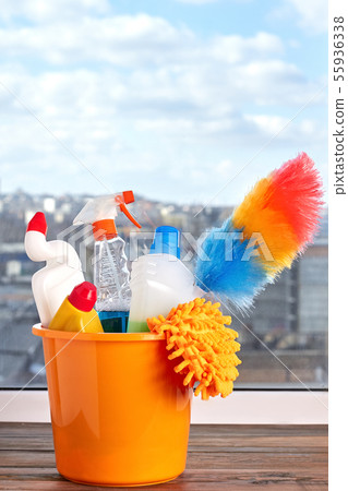 Cleaning supplies in plastic bucket. Cleaning supplies in plastic bucket. 55936338