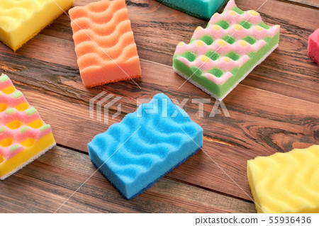 Housekeeping sponges on wooden background. 55936436