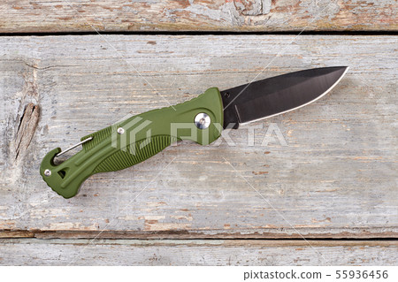 Army pocket knife with green handle. 55936456