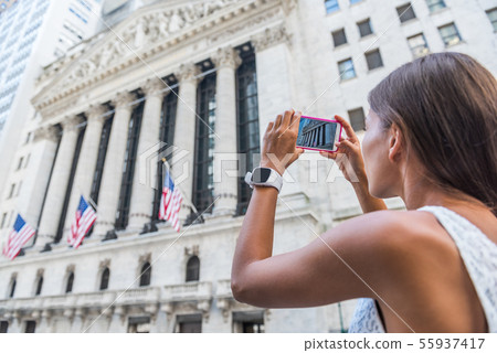 EDITORIAL New York Stock Exchange tourist taking picture 55937417