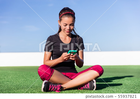 Active lifestyle fitness smartphone app girl happy Active lifestyle fitness smartphone app girl happy 55937821