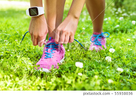Active lifestyle smartwatch runner tying shoes Active lifestyle smartwatch runner tying shoes 55938036