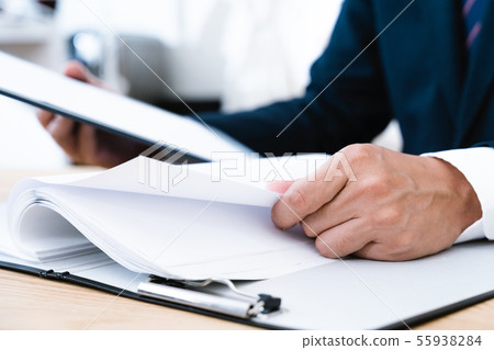 Documents and businessmen Documents and businessmen 55938284