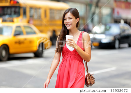 Urban woman drinking coffee in New York City Urban woman drinking coffee in New York City 55938672