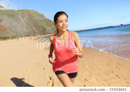 Running sports athlete runner woman on beach Running sports athlete runner woman on beach 55938681