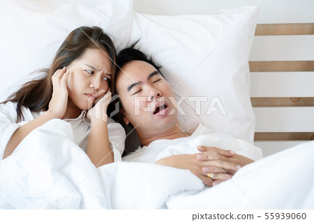 Man snoring loud makes women feel annoyed Man snoring loud makes women feel annoyed 55939060