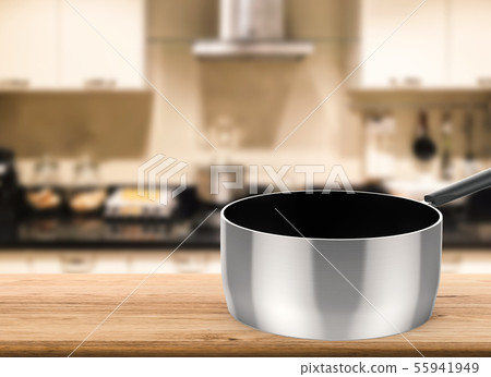 empty sauce pan on kitchen background empty sauce pan on kitchen background 55941949
