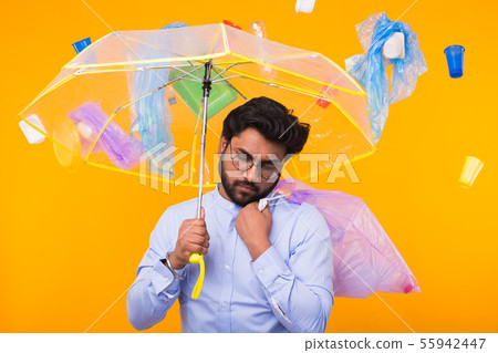 Environmental pollution, plastic recycling problem and ecology problem concept - sad indian man Environmental pollution, plastic recycling problem and ecology problem concept - sad indian man 55942447