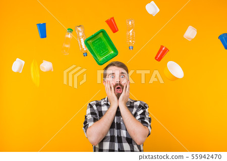 World Environment Day, plastic recycling problem and environmental disaster concept - Terrified man 55942470