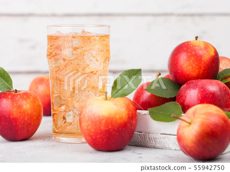 Glass of homemade organic apple cider with fresh 55942750