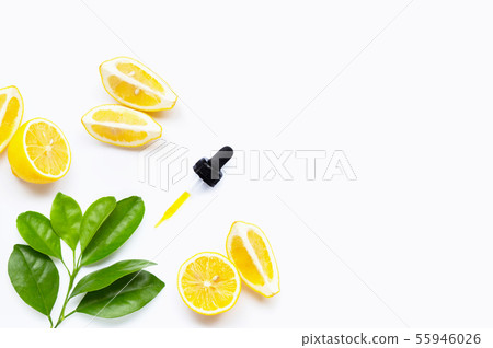 Lemon essential oil and lemon fruits on white 55946026