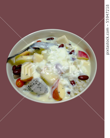 Mixed fruit in pink  plate isolated on cream 55947218
