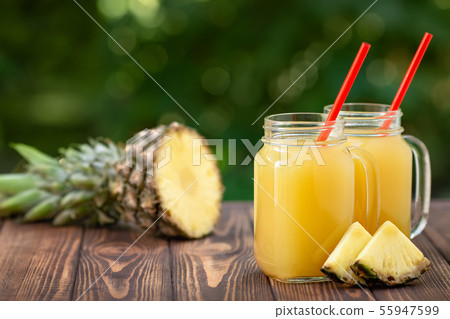 pineapple juice in mason jars 55947599