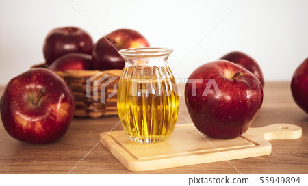 Close up red Apple fruit  and apple cider vinegar 55949894