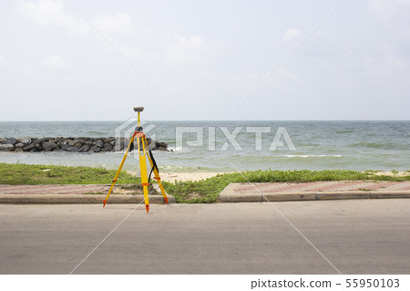 GPS surveying in field sea background, Global GPS surveying in field sea background, Global 55950103