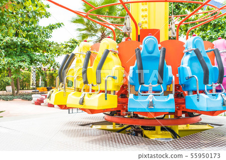 Colorful roller coaster seats at amusement park 55950173