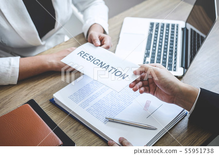 Businessman sending a resignation letter to 55951738