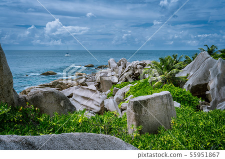 Sea scenery with white yacht on the trekking tour to secret Anse Marron beach, La Digue, Seychelles 55951867