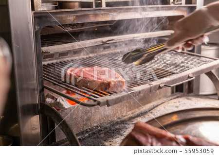 food, craft and delicious concept - cooking steak on a grill food, craft and delicious concept - cooking steak on a grill 55953059