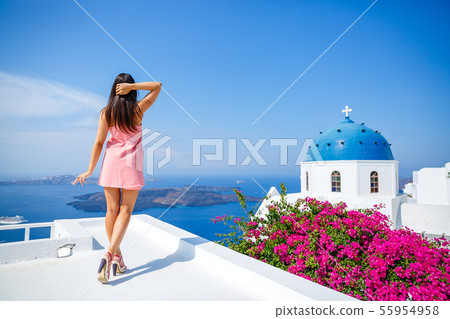 Young woman in a pink dress Young woman in a pink dress 55954958