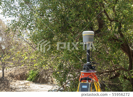 GPS surveying in field, Global Positioning System. 55956272