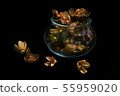Glass vase with decorative flowers, still life 55959020