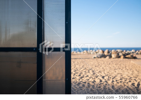 View on sandy beach from room at summer day 55960766