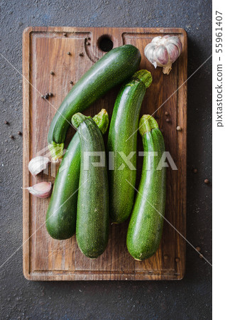 Fresh organic zucchini, garlic and parsley, herbs 55961407