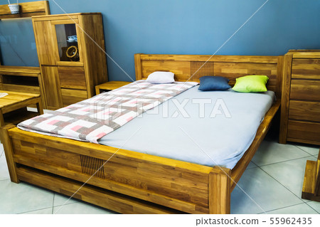 Ordinary room with oak wooden furniture. Ordinary room with oak wooden furniture. 55962435