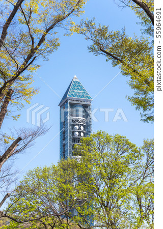 Higashiyama Sky Tower over the fresh green trees Higashiyama Sky Tower over the fresh green trees 55964691