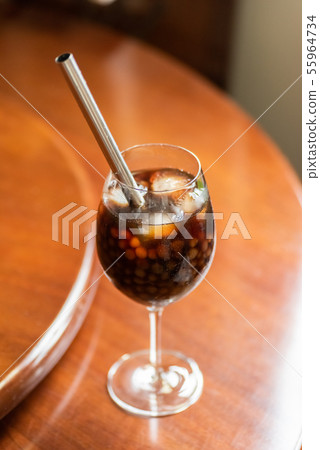 pearl milk tea on glass with stainless steel straw pearl milk tea on glass with stainless steel straw 55964734