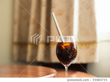 pearl milk tea on glass with stainless steel straw pearl milk tea on glass with stainless steel straw 55964735