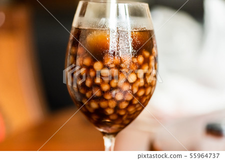 pearl milk tea on glass with stainless steel straw pearl milk tea on glass with stainless steel straw 55964737
