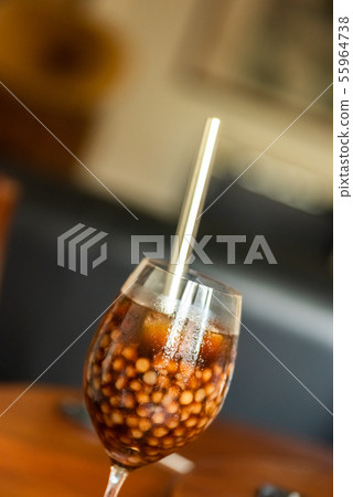 pearl milk tea on glass with stainless steel straw pearl milk tea on glass with stainless steel straw 55964738