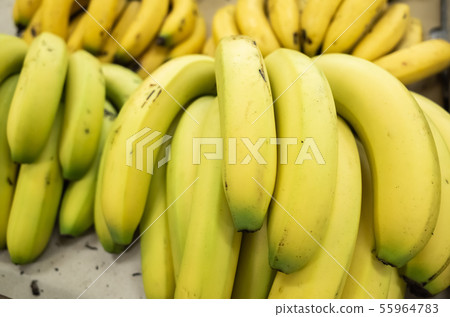 banana fruit stacked on the marketplace 55964783