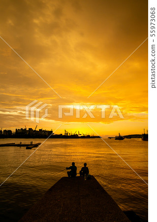 Taiwan's Kaohsiung Shin Kong Pier at dusk Asia, Taiwan, Kaohsiung Port City Dusk 55973068