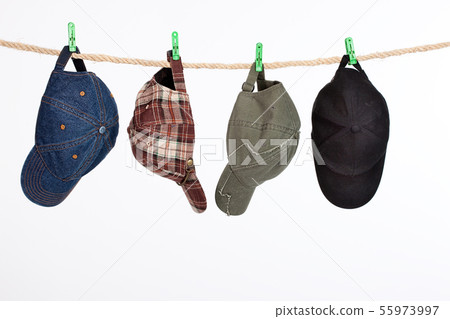 Four Caps On A Clothesline 55973997