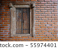 Old brick wall with brick window. 55974401
