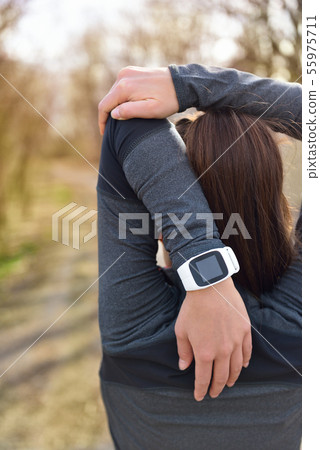 Smartwatch woman running with heart rate monitor 55975711
