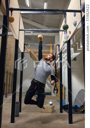 Powerful sportsman without forearm motivates other physically challenged people Powerful sportsman without forearm motivates other physically challenged people 55982622